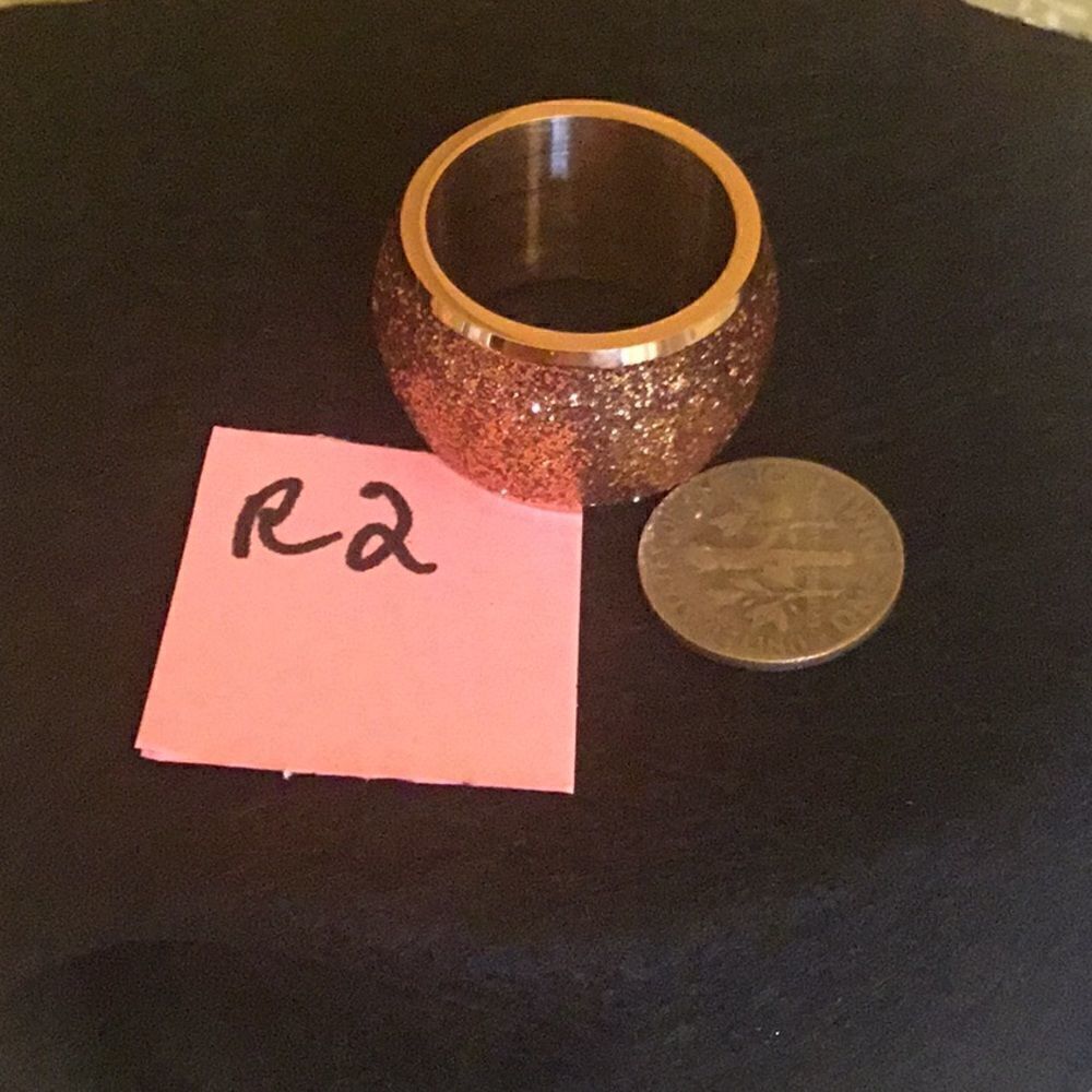 NEW ladies ring in size 10 wide band, costume jewelry